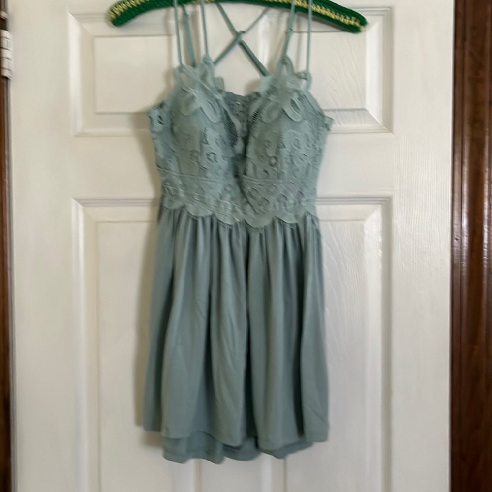 Very sexy plunge neckline cross cross back mini dress size medium